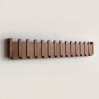 Sisica | Piano-Style Wooden Wall Rack | Handmade Natural Wood