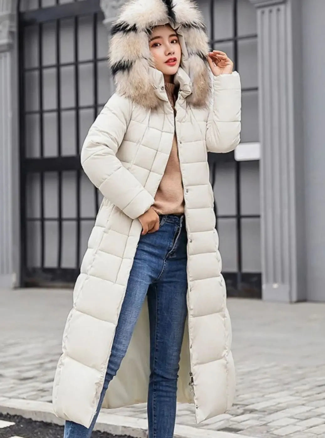 Women's Long Belted Quilted Hooded Puffer Coat with Fur Trim